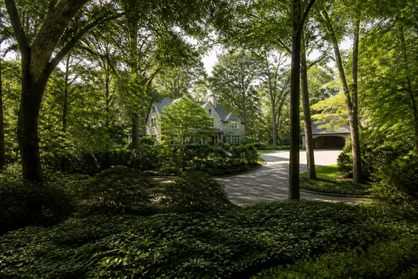 Secluded private residence screened by mature trees